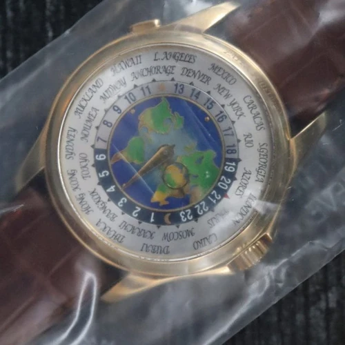 Patek Philippe World Time M38401 18k Yellow Gold World Time Ref. 5131J 001 Unworn Sealed 2010 Full Set 1
